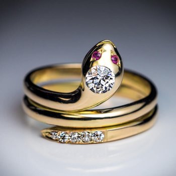 antique diamond and gold snake ring with ruby eyes