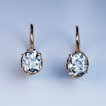 antique cushion cut diamond solitaire earrings