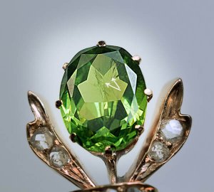 demantoid garnet with horsetail inclusions