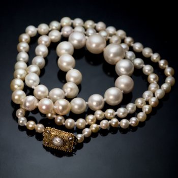vintage pearl necklace with a gold clasp