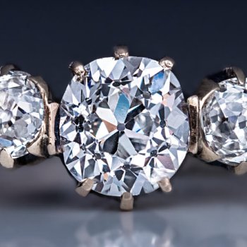 antique three stone diamond engagement ring