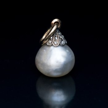 antique natural pearl jewelry - a semi baroque pearl pendant topped with a rose cut diamond cap