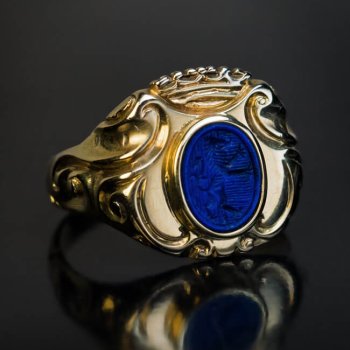 antique gold armorial signet ring with a lapis lazuli intaglio crest