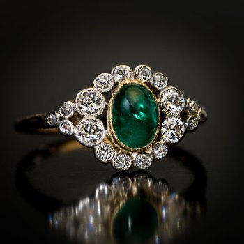 antique cabochon cut emerald and diamond engagement ring