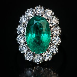 vintage mid-century French 3 ct emerald and diamond engagement ring in platinum and gold