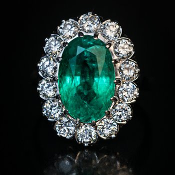 vintage mid-century French 3 ct emerald and diamond engagement ring in platinum and gold