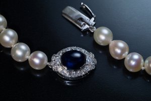 vintage pearl necklace with sapphire and diamond clasp