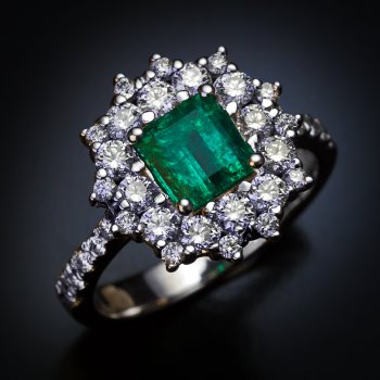 Vintage emerald and diamond engagement ring