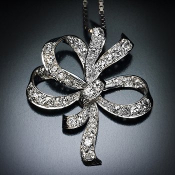 Art Deco era vintage diamond and platinum bow pendant necklace