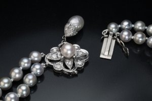 diamond clasp on a vintage pearl necklace