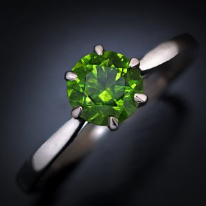 Demantoid garnet engagement ring