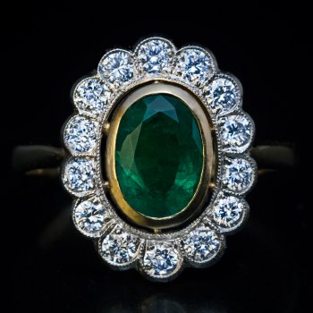 Vintage emerald diamond engagement cluster ring