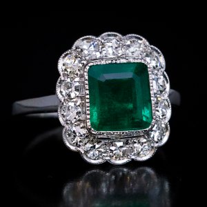Vintage emerald and diamond engagement ring