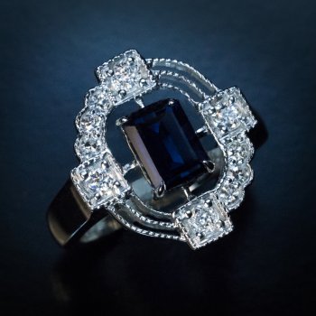 Asymmetrical design sapphire and diamond ring