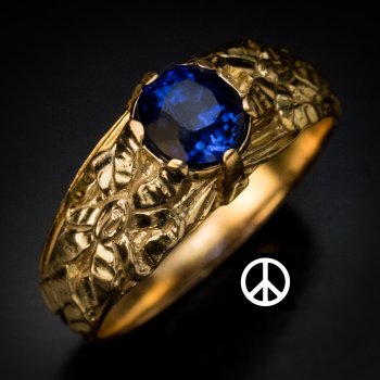Antique sapphire and chased gold ring