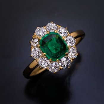 Classic antique Colombian emerald and diamond engagement ring