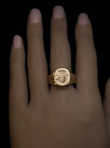 Antique gold signet ring engraved with a coat of arms