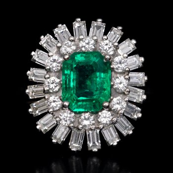 Emerald and diamond double halo ring