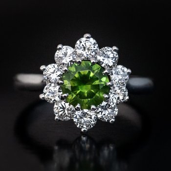 Russian demantoid and diamond engagement ring