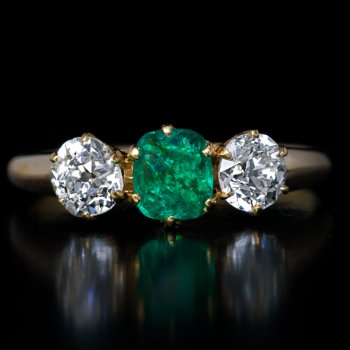 Antique emerald and diamond three stone ring