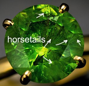 Horsetail inclusions in demantoids