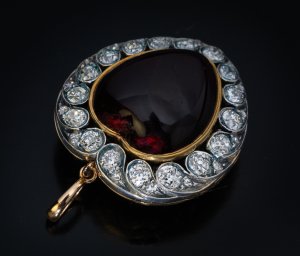 Antique Victorian garnet and diamond heart shaped locket pendant