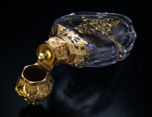 Antique cut glass and gold scent bottle
