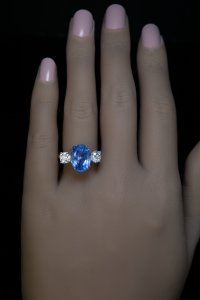 Ceylon no heat sapphire and diamond three stone ring