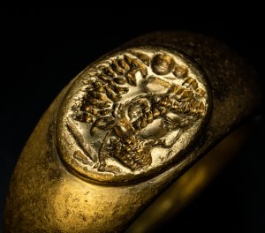 Antiquities - a gold ring with Hercules wearing the skin of the Nemean lion as a helmet