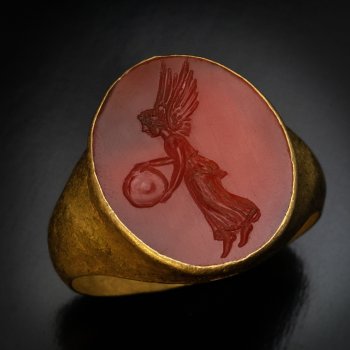 Roman gold ring with carnelian intaglio depicting Victory