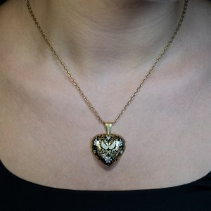 Antique heart pendant locket embellished with enamel
