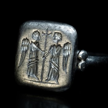 Byzantine silver ring with two angels and a cross c. 500